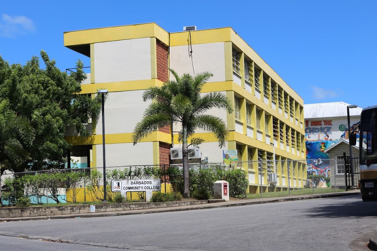 Barbados Community College building with palm trees